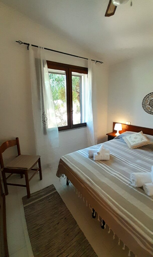 Casa Mirto - Schlafzimmer mit Doppelbett